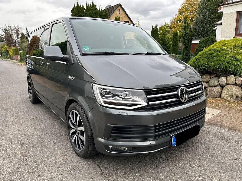 Grau Gebraucht 2016 VW Multivan Van | 24.950 € (Superpreis) - Bild 1/4