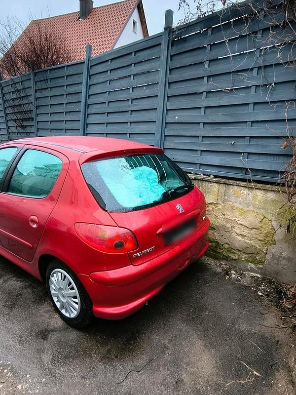 Gebraucht Peugeot 206 75 PS (55 kW) 2009 Rot Kleinwagen
