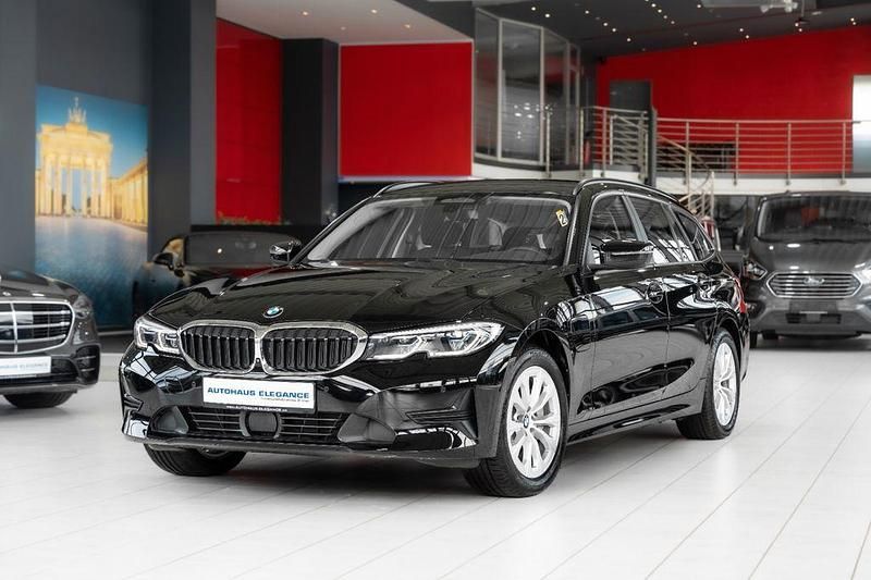 Schwarz ii Gebraucht 2020 BMW 330e Advantage Kombi | 24.980 € (Fairer Preis) - Bild 1/4