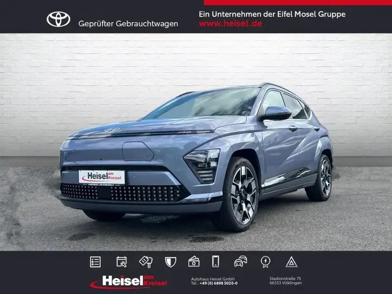 Meta blue / mic Gebraucht 2024 Hyundai Kona Prime SUV | 43.960 € (Teuer) - Bild 1/1