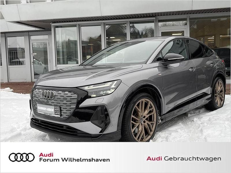 Taifungrau (grau) Gebraucht 2021 Audi Q4 Sportback e-tron Comfort SUV | 34.495 € (Fairer Preis) - Bild 1/4