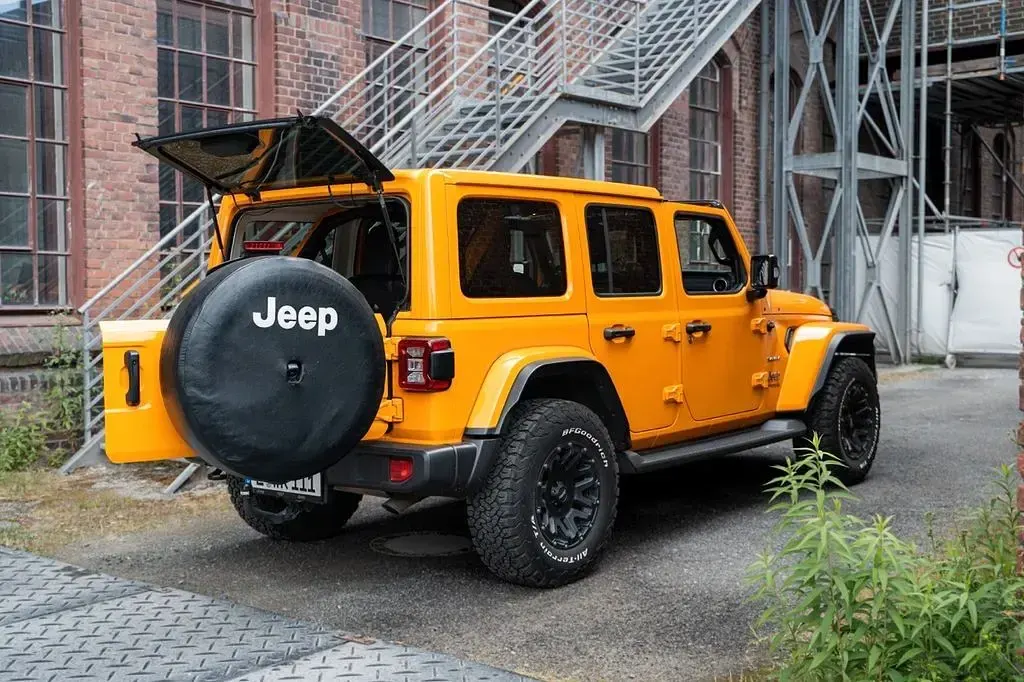 Gebraucht Jeep Wrangler Sahara 272 PS (200 kW) 2021 Orange SUV
