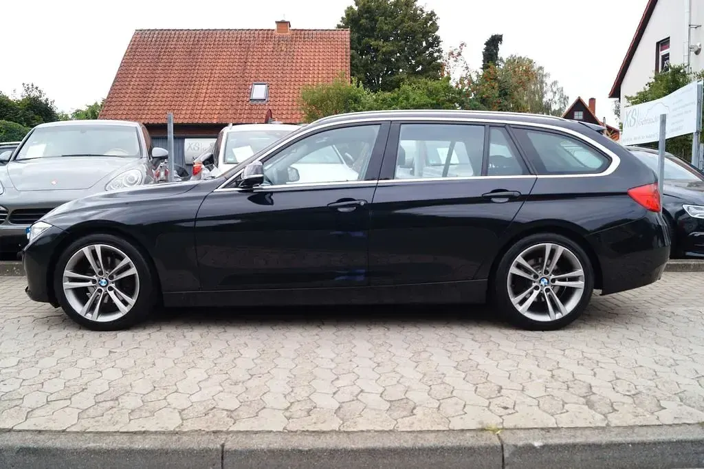 Gebraucht BMW 320 Sport Line 184 PS (135 kW) 2012 Schwarz Kombi
