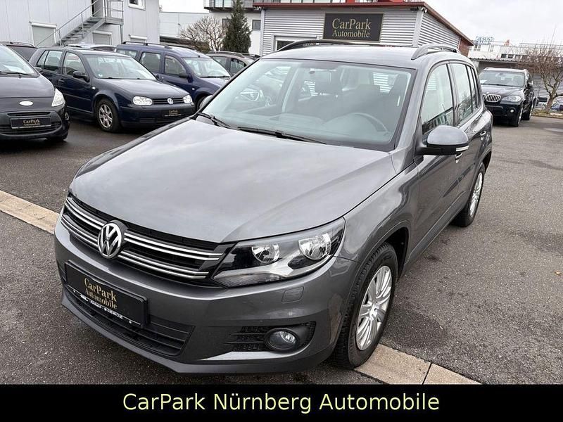 Grau Gebraucht 2014 VW Tiguan Trendline SUV | 13.999 € (Fairer Preis) - Bild 1/3