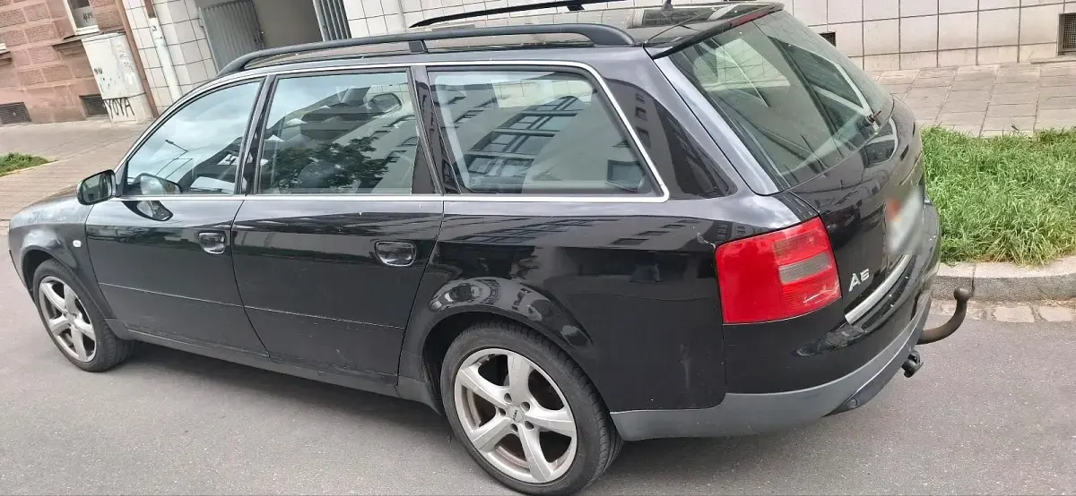 Używany Audi A6 193 KM (141 kW) 1999 Czarny Kombi