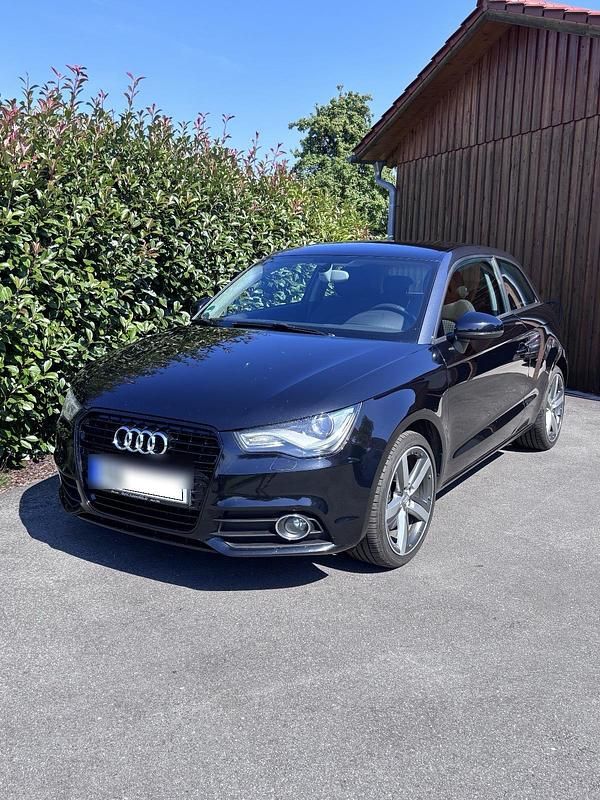 Schwarz Gebraucht 2013 Audi A1 Attraction Kleinwagen | 11.900 € - Bild 1/4