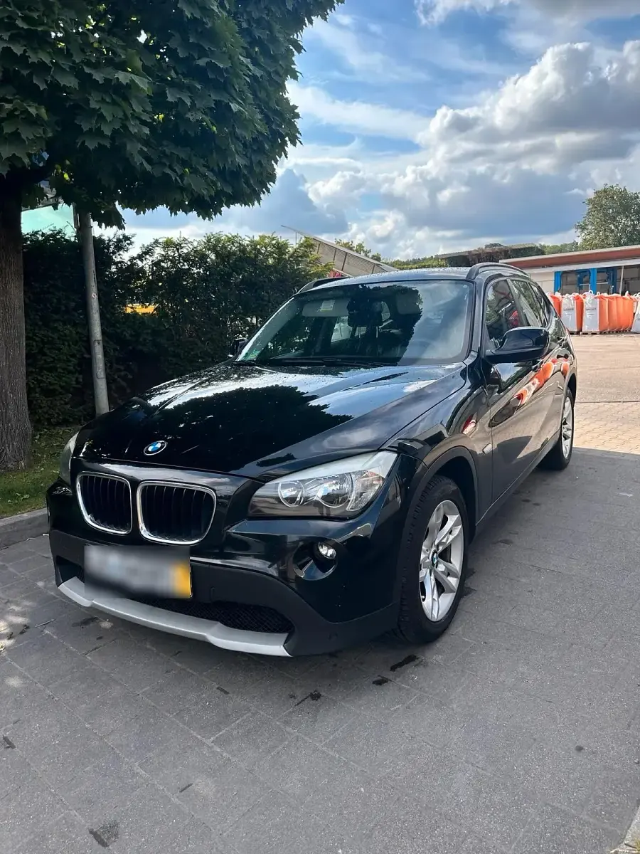 Gebraucht BMW X1 143 PS (105 kW) 2011 Schwarz SUV