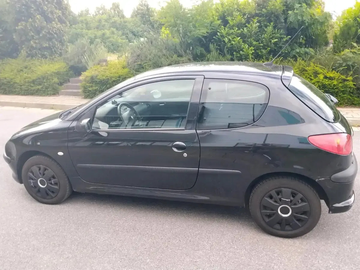Gebraucht Peugeot 206 74 PS (54 kW) 2004 Schwarz Kleinwagen