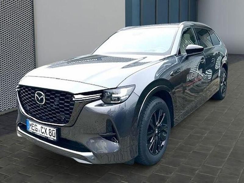 Machine gray Gebraucht 2024 Mazda CX-80 Homura-Line SUV | 56.990 € (Fairer Preis) - Bild 1/4