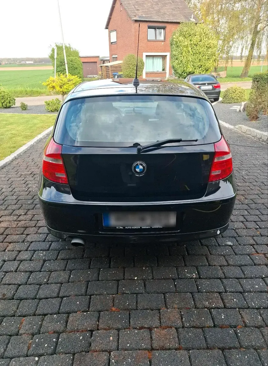 Używany BMW 116 122 KM (89 kW) 2008 Czarny Hatchback