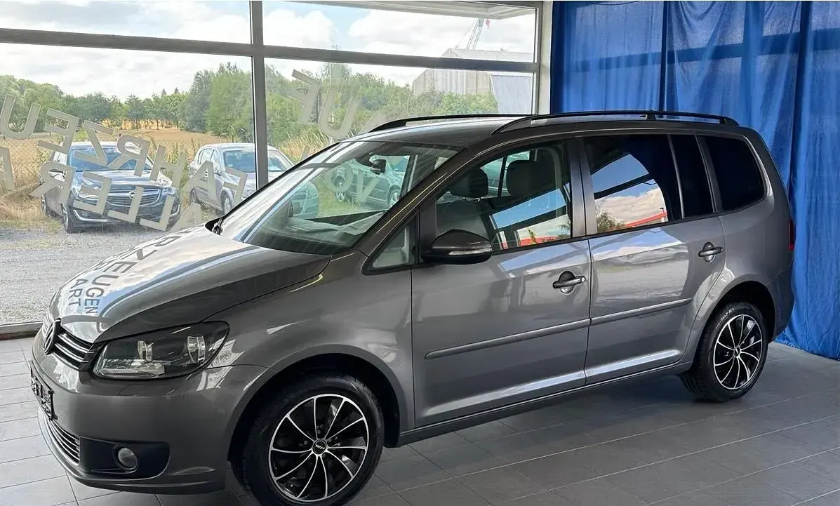 Gebraucht VW Touran Comfortline 140 PS (102 kW) 2012 Grau Van / Kleinbus