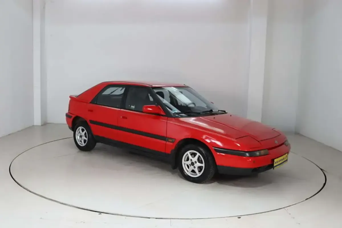 Gebraucht Mazda 323F 88 PS (64 kW) 1993 Rot Limousine
