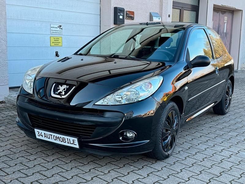 Gebraucht Peugeot 206+ 75 PS (55 kW) 2010 Schwarz Kleinwagen