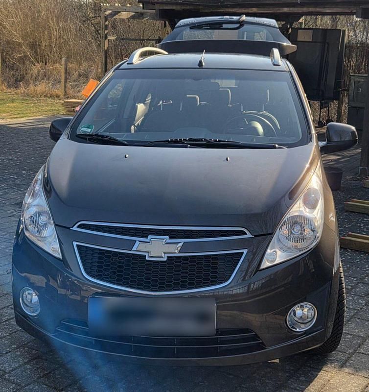 Gebraucht Chevrolet Spark 81 PS (59 kW) 2011 Schwarz Kleinwagen