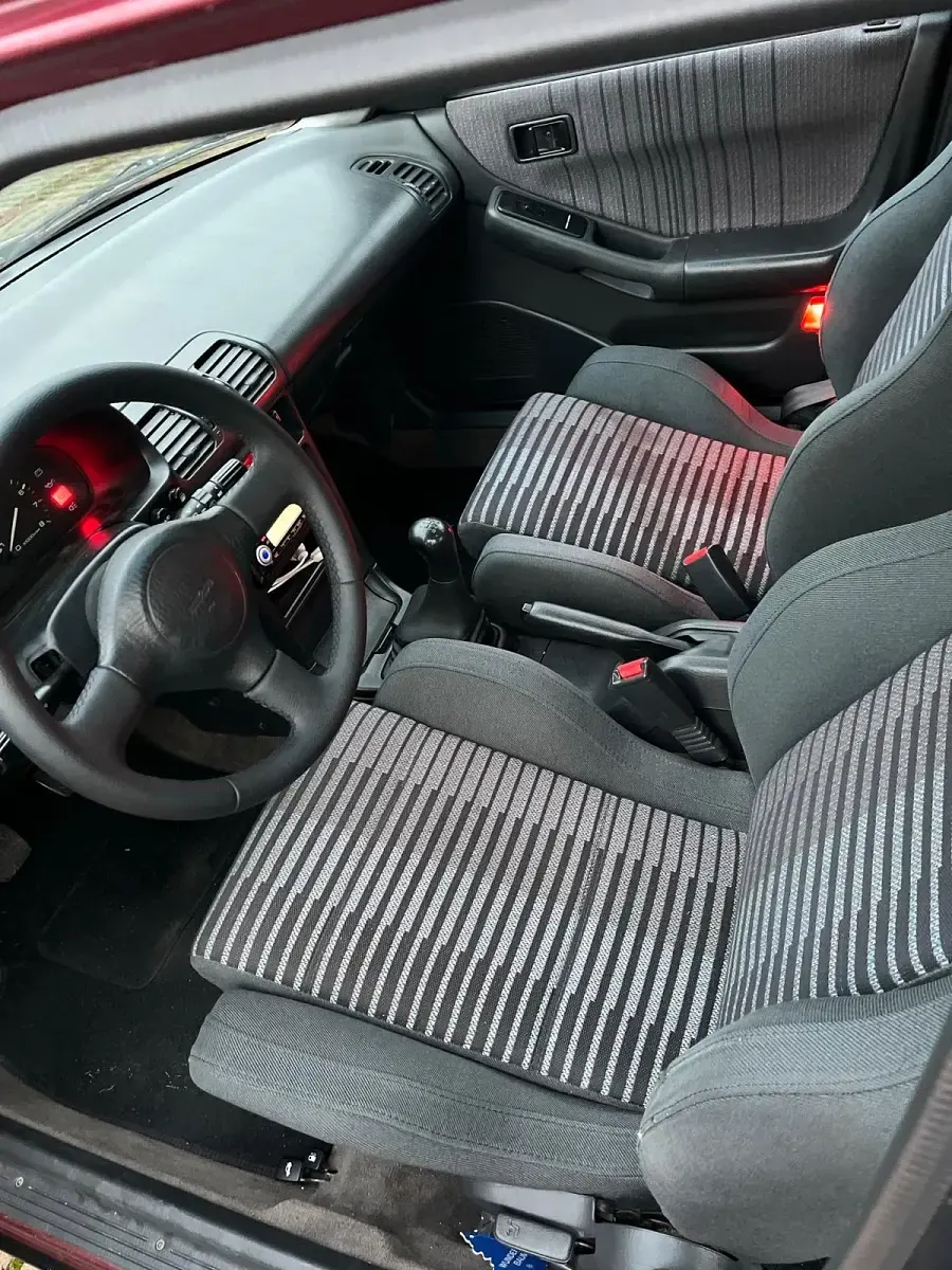 Gebraucht Mazda 323F 88 PS (64 kW) 1994 Rot Kleinwagen