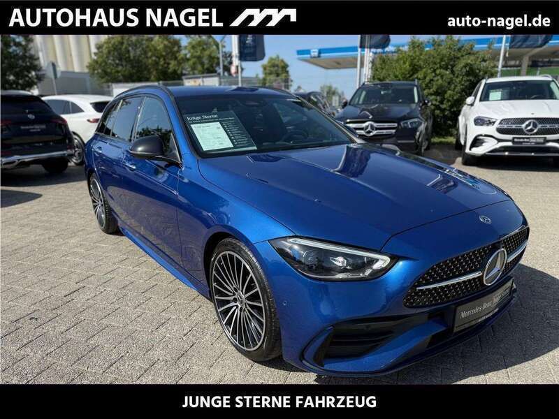 Lack spektralblau Gebraucht 2021 Mercedes C220 AMG Kombi | 31.680 € - Bild 1/4