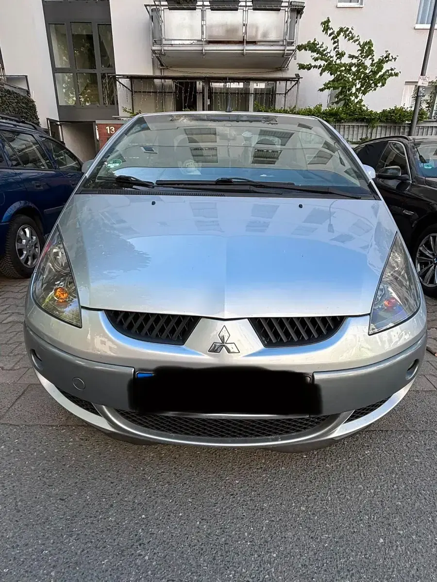 Second-hand Mitsubishi Colt 150 CP (110 kW) 2006 Gri Cabrio