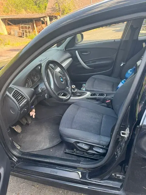 Gebraucht BMW 116 116 PS (85 kW) 2011 Schwarz Kleinwagen