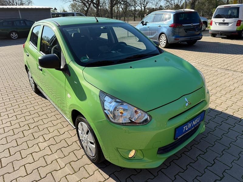 Gebraucht Mitsubishi Space Star 71 PS (52 kW) 2013 F24 ext grün metallic Van / Kleinbus
