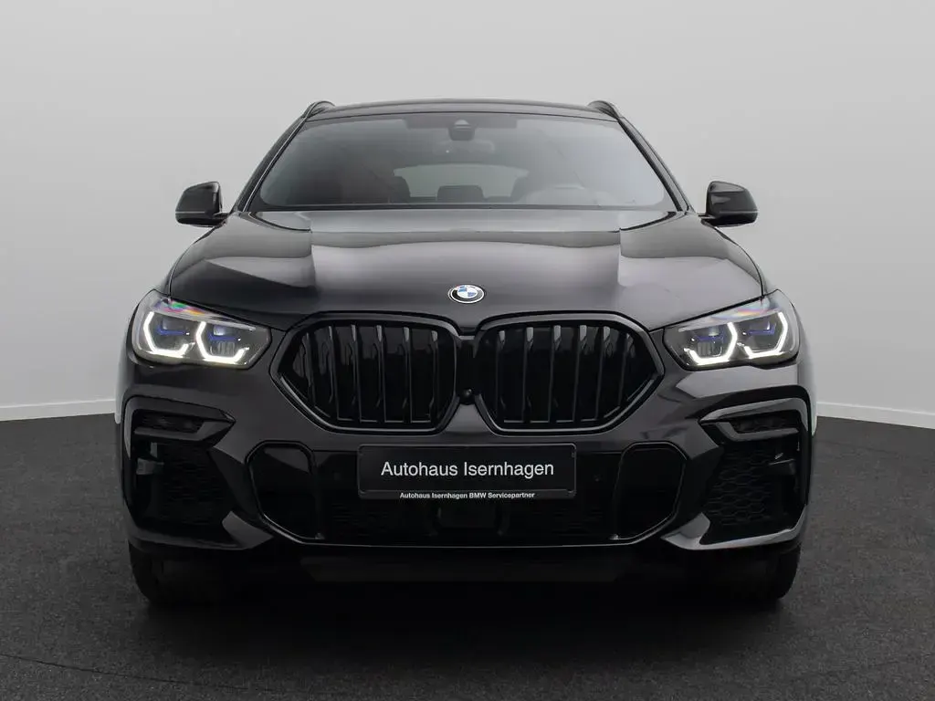 Gebraucht BMW X6 M50 Performance 530 PS (389 kW) 2023 Saphirschwarz  475braun SUV