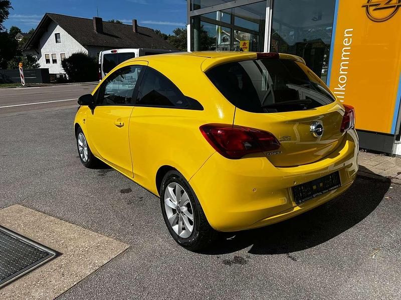 Gebraucht Opel Corsa drive 90 PS (66 kW) 2016 Sunny yellow (uni) Kleinwagen