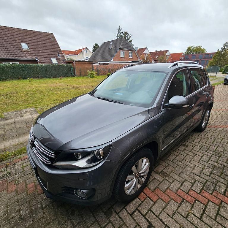 Grau Gebraucht 2012 VW Tiguan Sportline SUV | 7.999 € (Guter Preis) - Bild 1/4