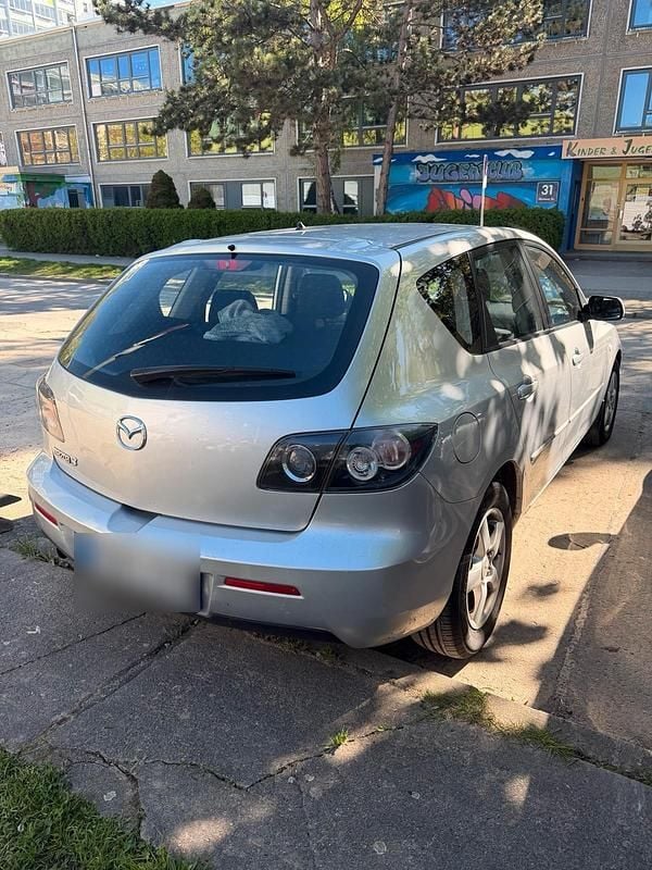 Usado Mazda 3 105 HP (77 kW) 2007 Cinzento Citadino