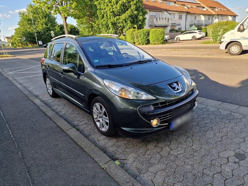 Grau Gebraucht 2009 Peugeot 207 Kombi | 3.490 € (Fairer Preis) - Bild 1/4