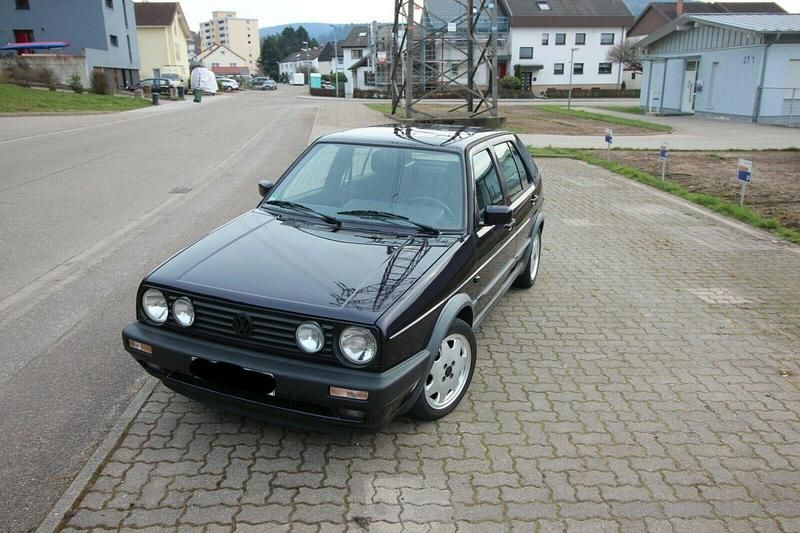 Violett metallic Gebraucht 1991 VW Golf II Limousine | 12.499 € - Bild 1/4