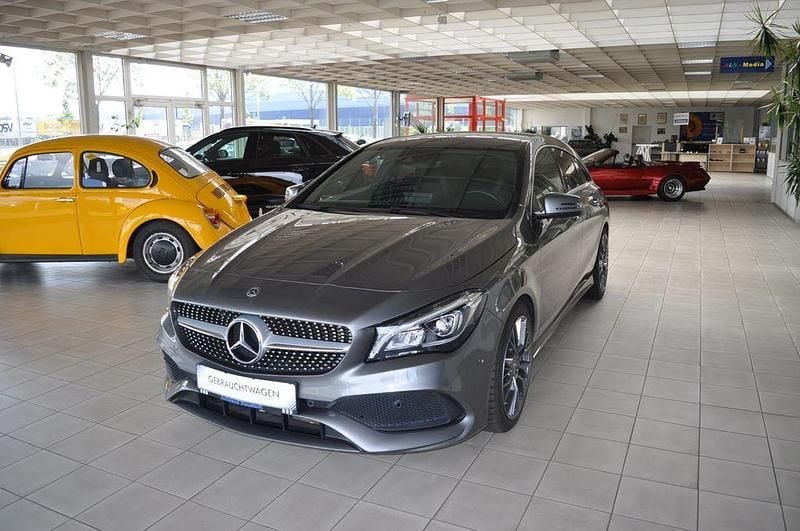 Grau Gebraucht 2018 Mercedes CLA250 AMG line Limousine | 20.990 € (Superpreis) - Bild 1/4