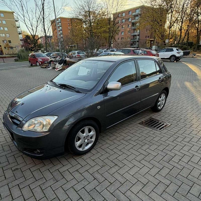 Grau Gebraucht 2007 Toyota Corolla Limousine | 3.850 € (Fairer Preis) - Bild 1/4