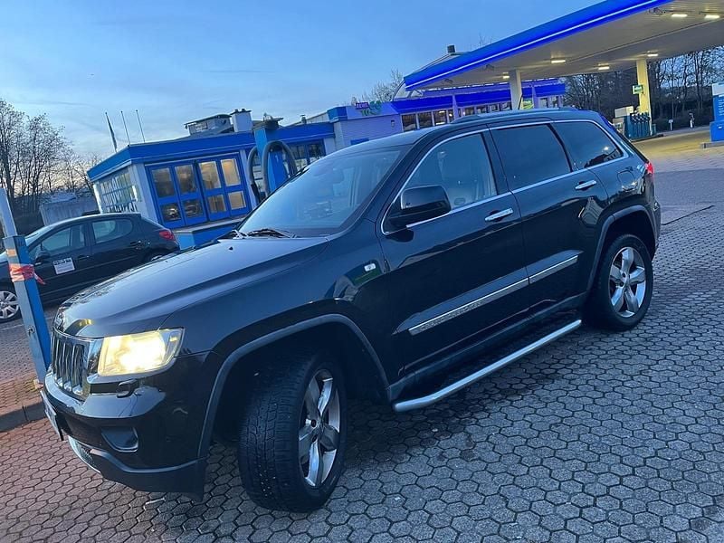 Schwarz Gebraucht 2011 Jeep Grand Cherokee SUV | 7.850 € (Fairer Preis) - Bild 1/4