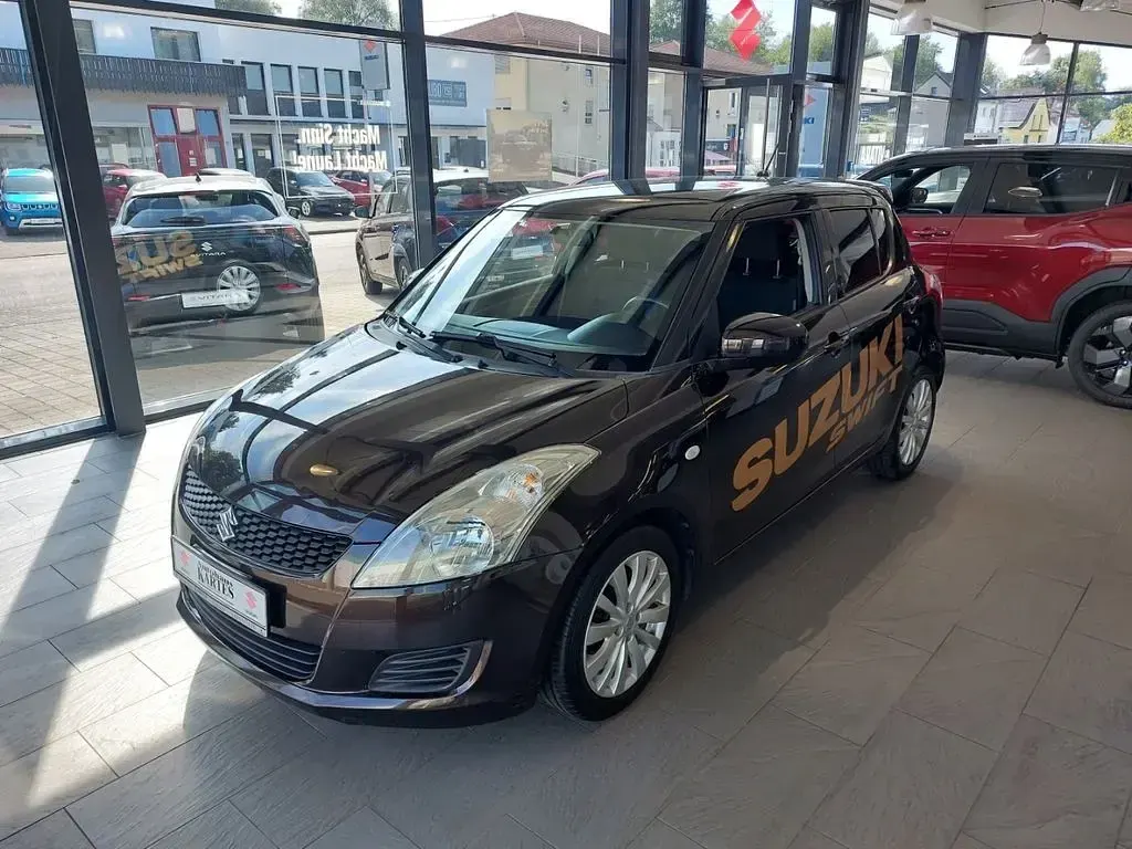 Gebraucht Suzuki Swift X-TRA 94 PS (69 kW) 2012 Braun Kleinwagen