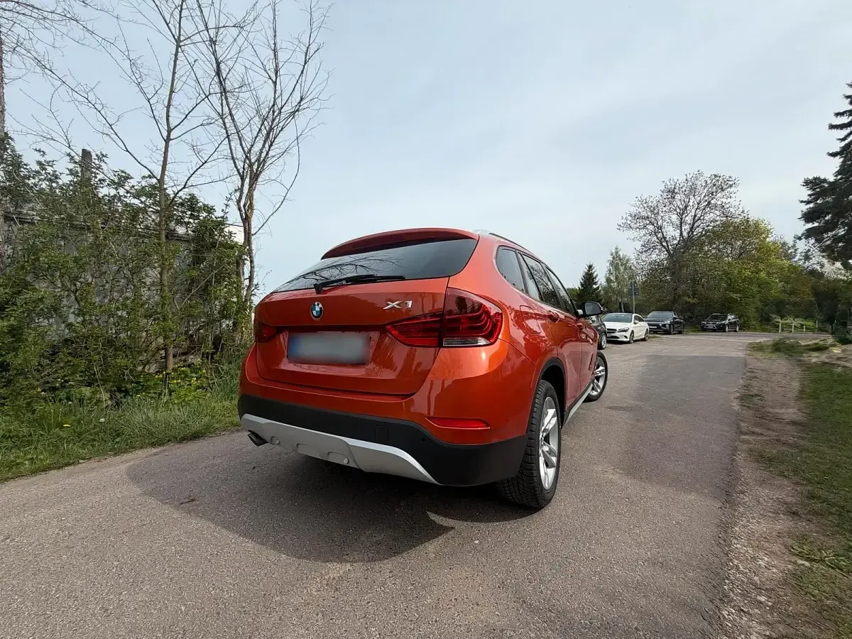 Gebraucht BMW X1 143 PS (105 kW) 2013 Orange SUV