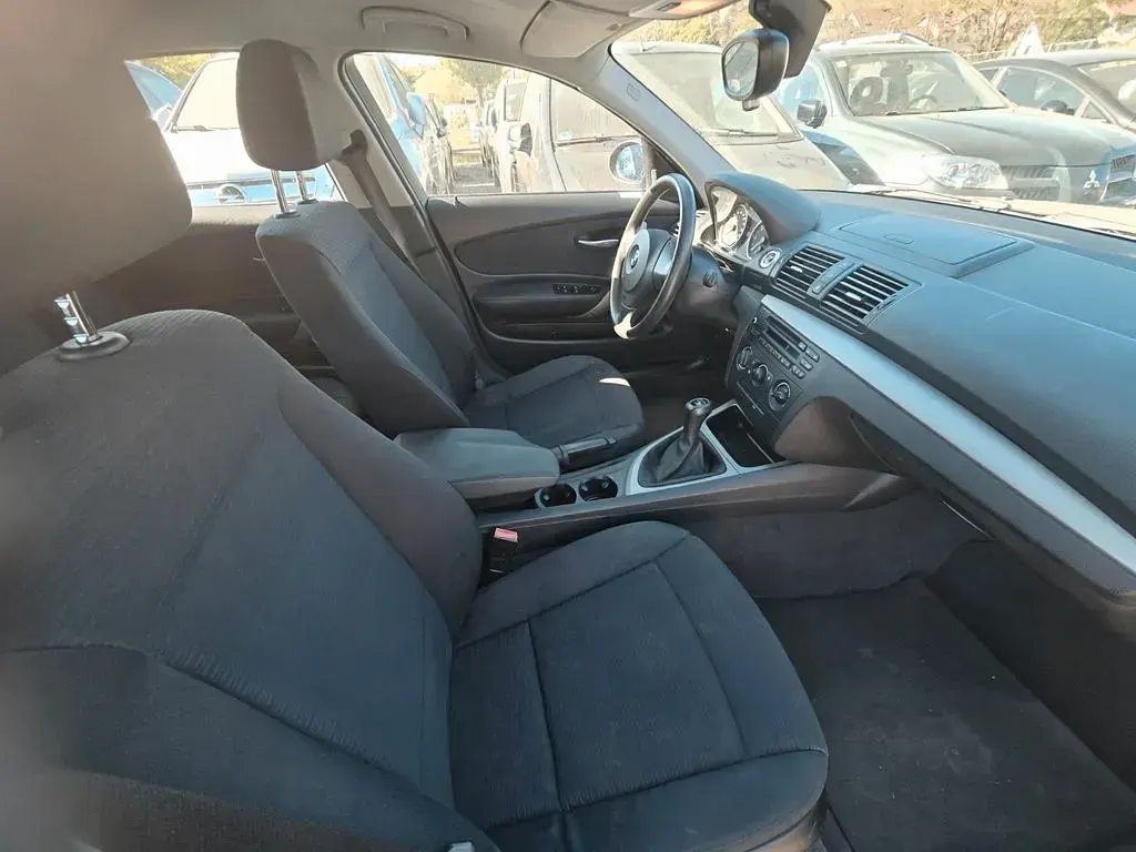 Second-hand BMW 116 122 CP (89 kW) 2008 Negru Hatchback