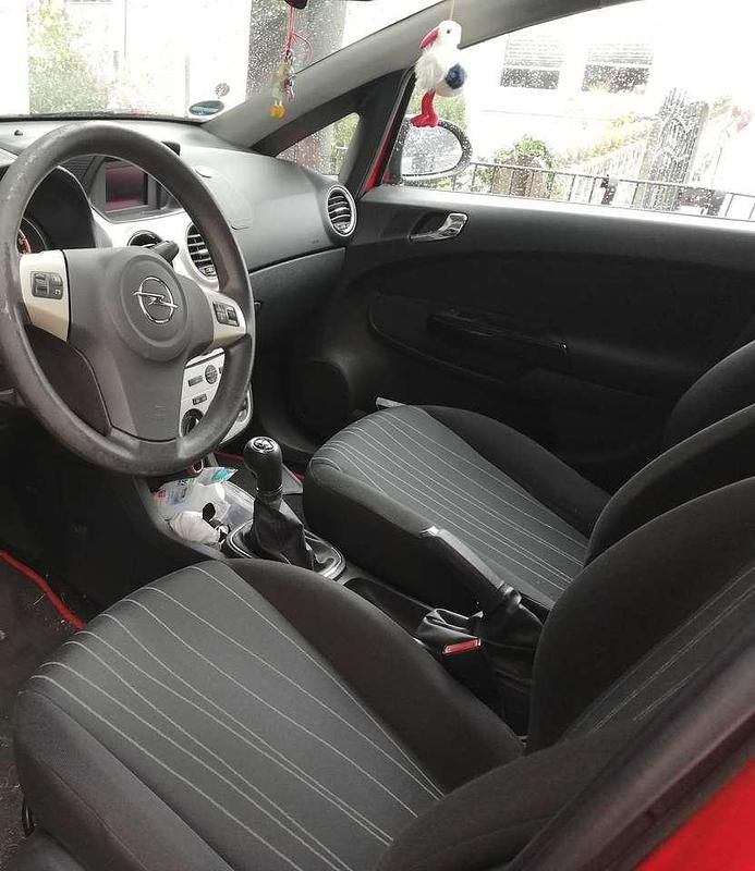 Gebraucht Opel Corsa Edition 90 PS (66 kW) 2009 Rot Kleinwagen