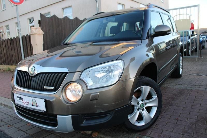 Braun Gebraucht 2013 Skoda Yeti GreenLine SUV | 4.990 € - Bild 1/4
