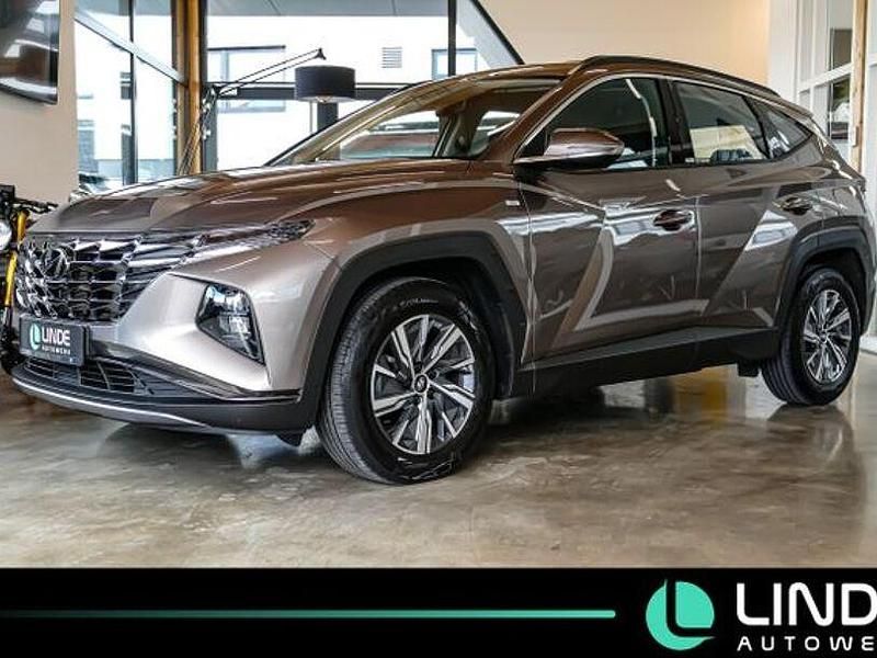 Silky bronze / met Gebraucht 2021 Hyundai Tucson Select SUV | 22.900 € (Guter Preis) - Bild 1/4