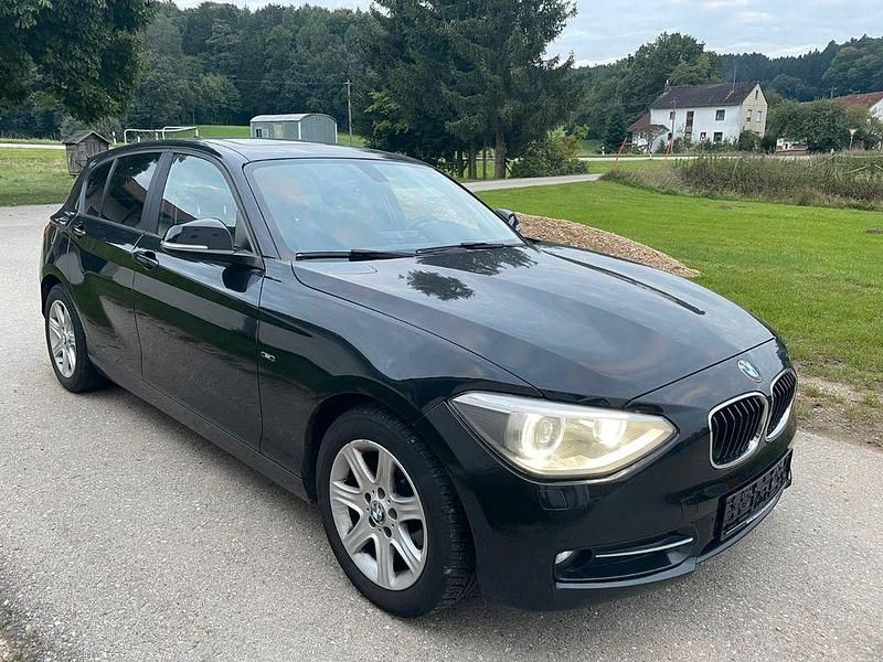 Schwarz Gebraucht 2013 BMW 116 Sport Line Kleinwagen | 7.675 € (Fairer Preis) - Bild 1/4