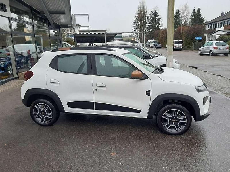Gebraucht Dacia Spring Extreme 47 kW (65 PS) 2023 Kaolinweiss Kleinwagen
