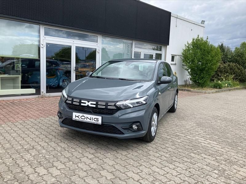 Grau Gebraucht 2024 Dacia Sandero Expression Kleinwagen | 17.699 € (Guter Preis) - Bild 1/4