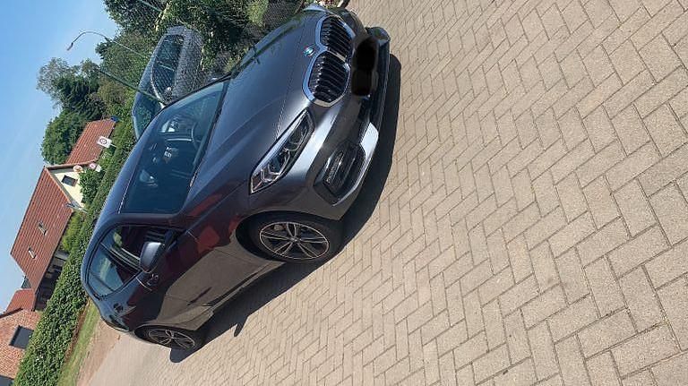 Grau Gebraucht 2019 BMW 118 Sport Line Kleinwagen | 18.999 € (Fairer Preis) - Bild 1/4
