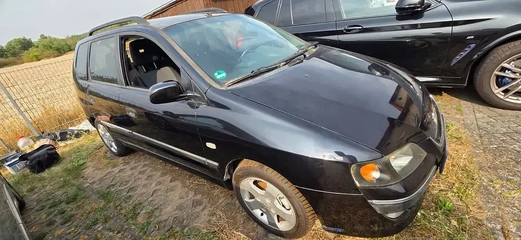 Gebraucht Mitsubishi Space Star 98 PS (72 kW) 2003 Schwarz Van / Kleinbus