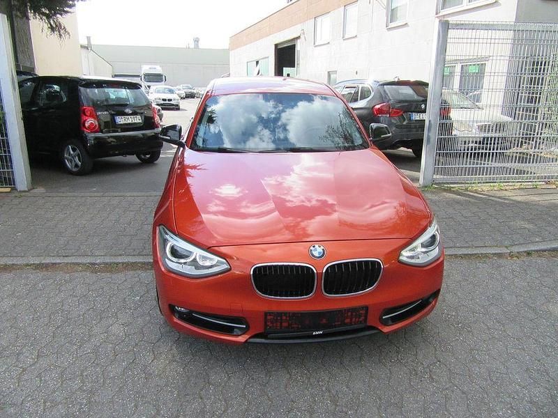 Orange Gebraucht 2013 BMW 118 Sport Line Kleinwagen | 7.550 € (Guter Preis) - Bild 1/4