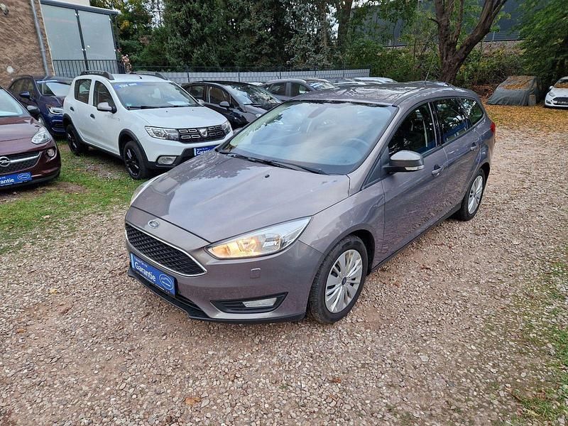 Grau Gebraucht 2015 Ford Focus Kombi | 8.999 € (Fairer Preis) - Bild 1/4