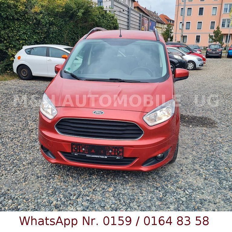 Orange Gebraucht 2017 Ford Tourneo Courier Titanium Van / Kleinbus | 8.899 € (Guter Preis) - Bild 1/4