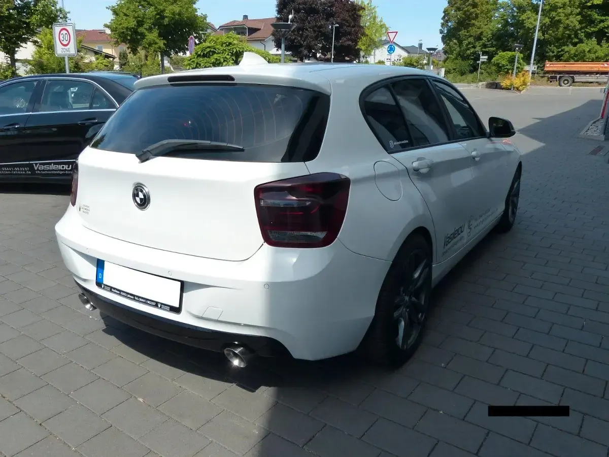 Używany BMW 118 Performance 143 KM (105 kW) 2011 Biały Hatchback