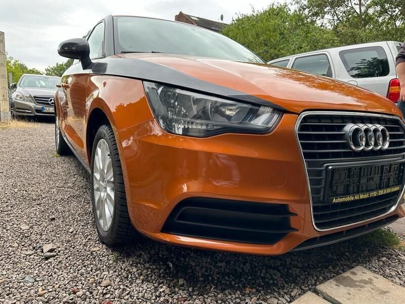 Orange Gebraucht 2012 Audi A1 Sportback Kleinwagen | 8.599 € (Guter Preis) - Bild 1/4