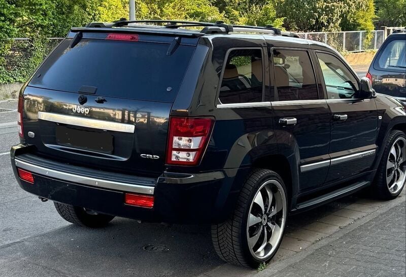 Schwarz Gebraucht 2010 Jeep Grand Cherokee Overland SUV | 8.700 € - Bild 1/4