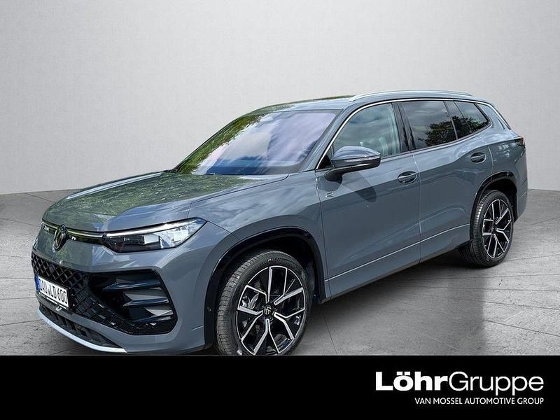 Delfingrau metallic Gebraucht 2025 VW Tayron R-line SUV | 56.980 € (Fairer Preis) - Bild 1/4